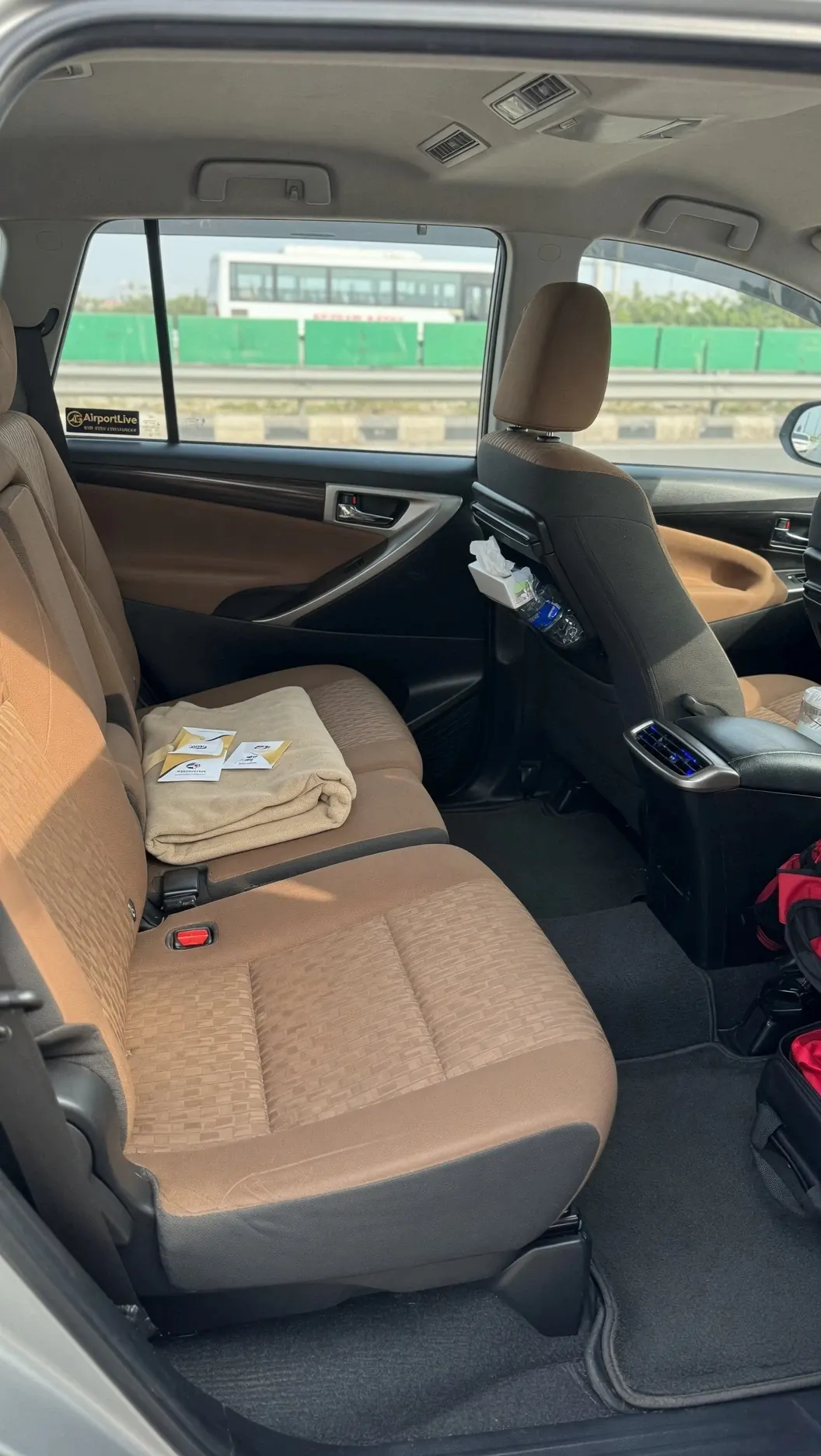 Clean Innova Crysta interior for comfortable AirportLive airport transfer